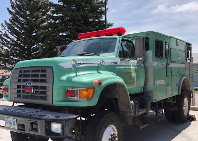 Mint-green Ford fire utility truck marked Vedauwoo VV-2 Vol. Fire Dept., is an example of Federal Excess Personal Property currently in service